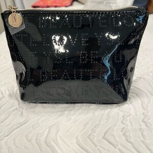 NEW YVES SAINT
LAURENT~YSL Beaute
Love~ Black Patent
Cosmetic Bag~Small